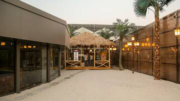 Indoor pool, outdoor pool, free pool cabanas, pool umbrellas