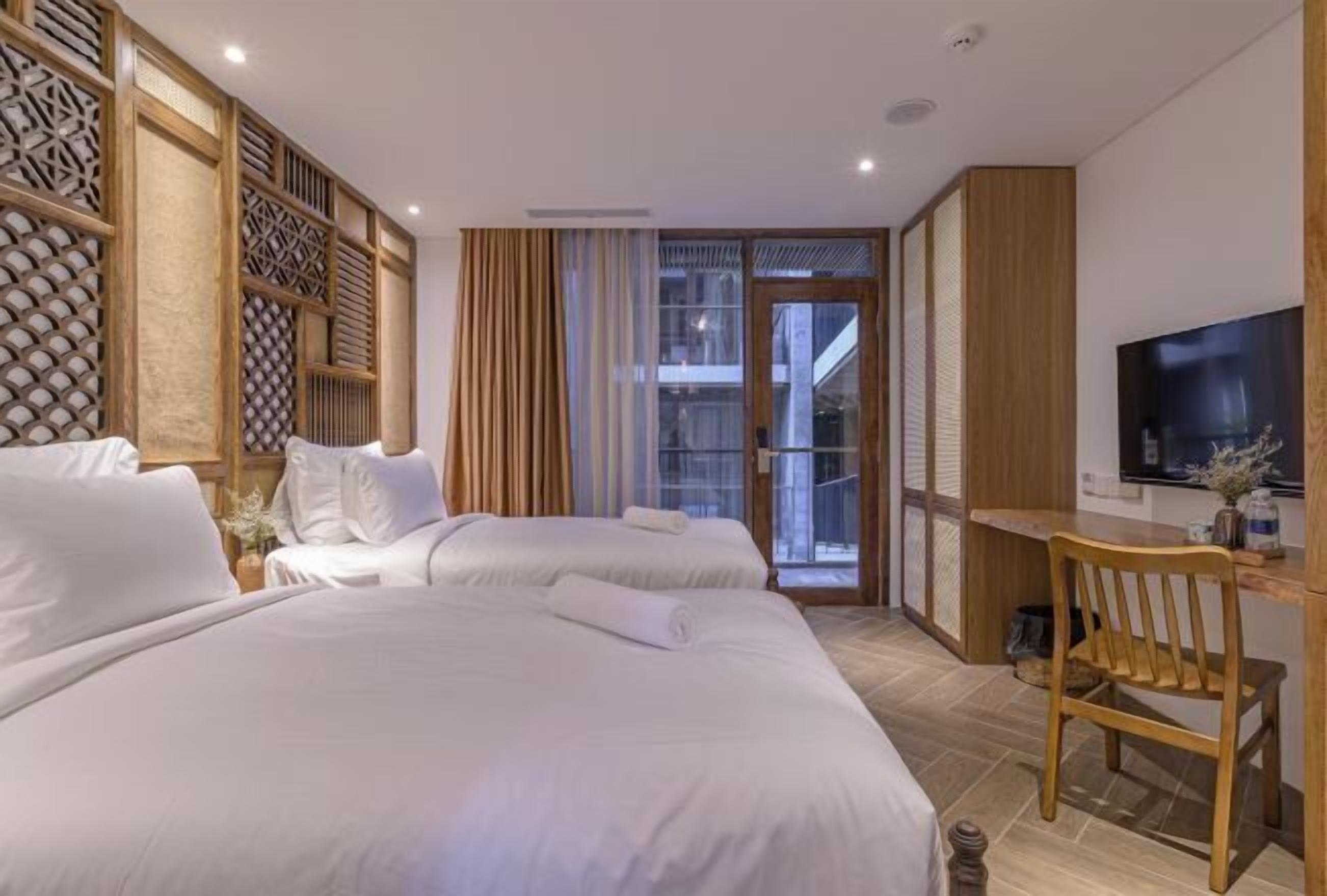 Ropa de cama de alta calidad, minibar y escritorio 