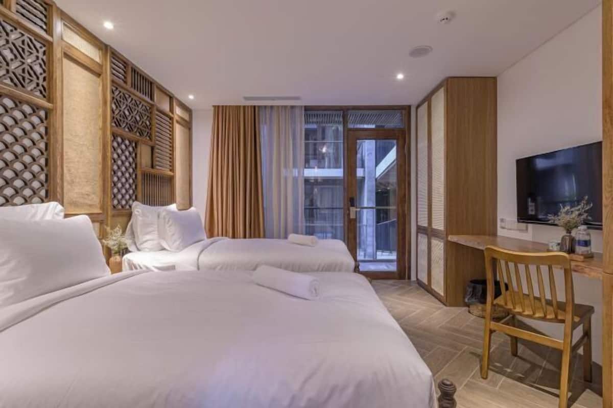 Roba de llit d'alta qualitat, minibar i escriptori