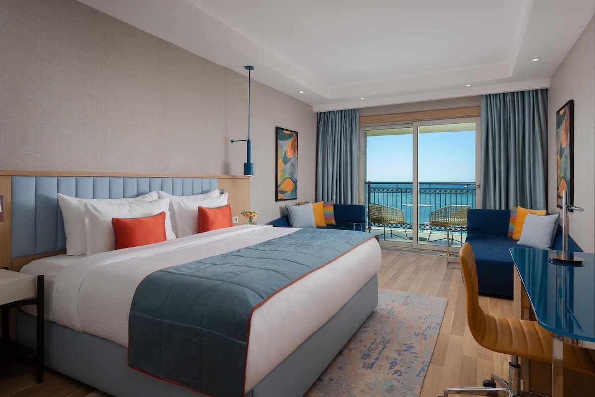 Deluxe Room, 1 King Bed, Sea View | 1 bedroom, minibar, desk, laptop workspace