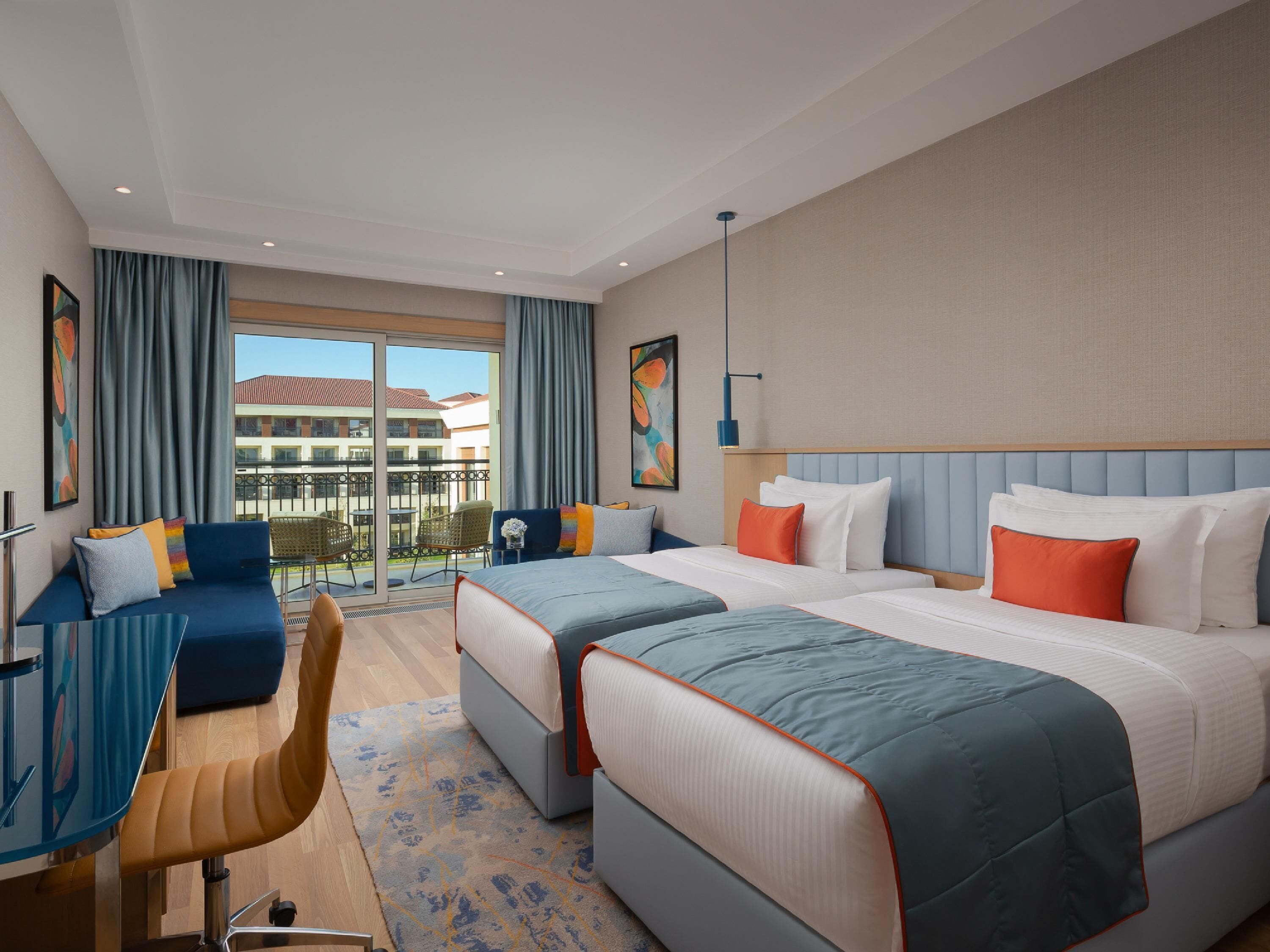 Tomannsrom – deluxe, 2 enkeltsenger, hageutsikt | Minibar, skrivebord, skrivebord for bærbar PC og lydisolert