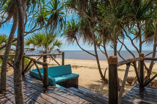 Saadani Safari Lodge - bush, river, beach