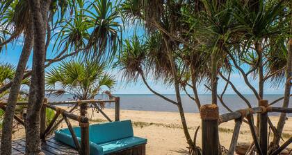 Saadani Safari Lodge - bush, river, beach