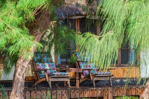 Double Room, 1 King Bed, Sea View | Terrace/patio - Saadani Safari Lodge - bush, river, beach (Saadani)
