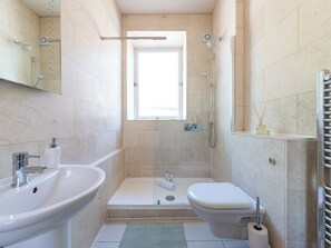 Shower, hair dryer, soap, shampoo