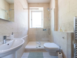 Shower, hair dryer, soap, shampoo