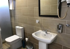 Shower, free toiletries, hair dryer, towels