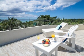 Terrace/patio - 7 Mile Beach private Beach Club, ocean views from Roof deck and Pool Pavilion (West Bay)