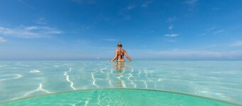 7 Mile Beach private Beach Club, ocean views from Roof deck and Pool Pavilion