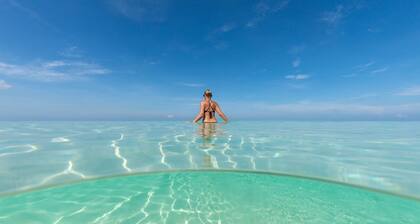 7 Mile Beach private Beach Club, ocean views from Roof deck and Pool Pavilion