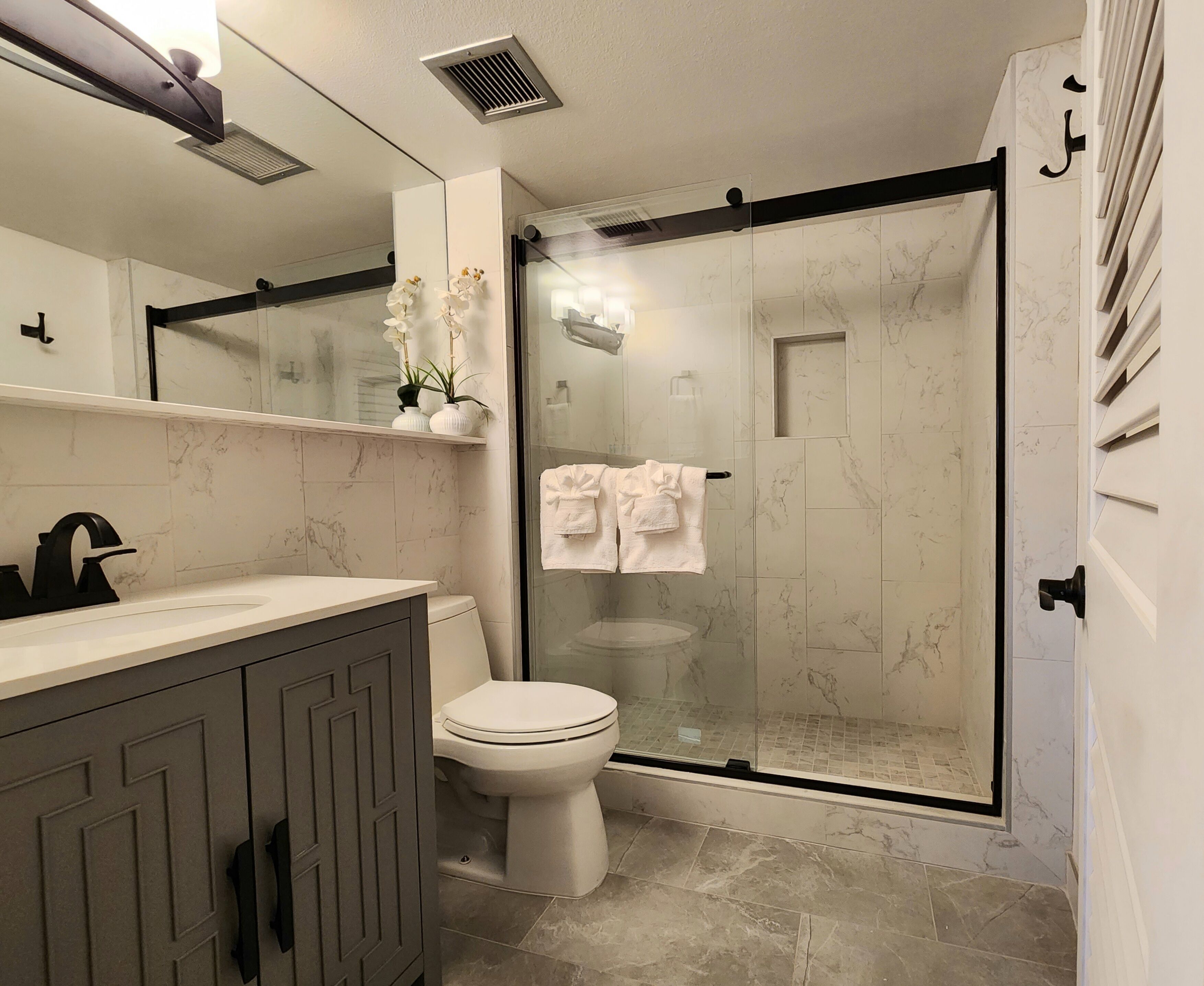 Bathtub, hair dryer, towels