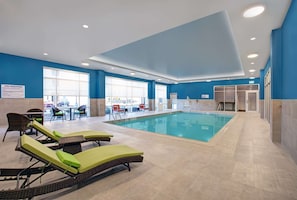 Indoor pool, open 9:00 AM to 10:00 AM, pool loungers