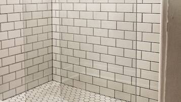 Bathtub, hair dryer, towels, soap