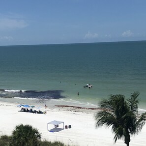 On the beach, sun loungers, beach towels