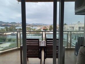 Outdoor dining - Nice and cozy apartment, private parking and sea views in Cabo de Palos. (Cabo de Palos)