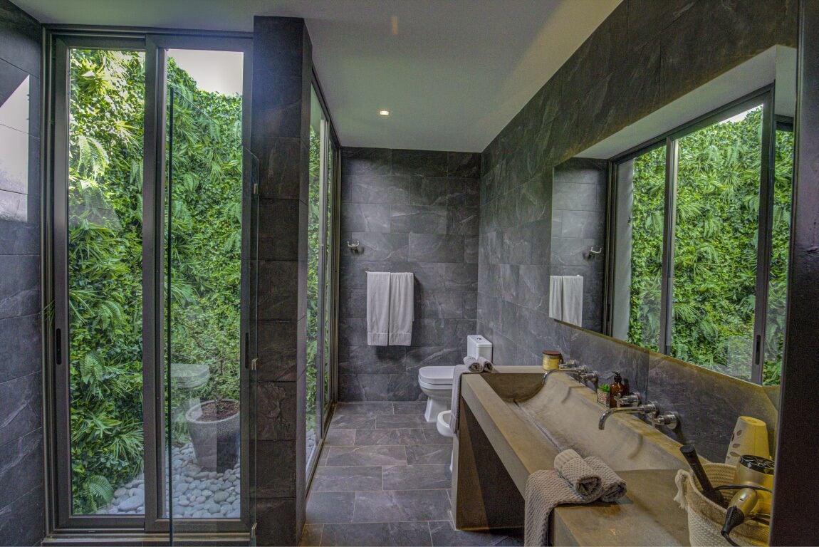 deluxe king studio | bathroom | designer toiletries, hair dryer, bathrobes, bidet