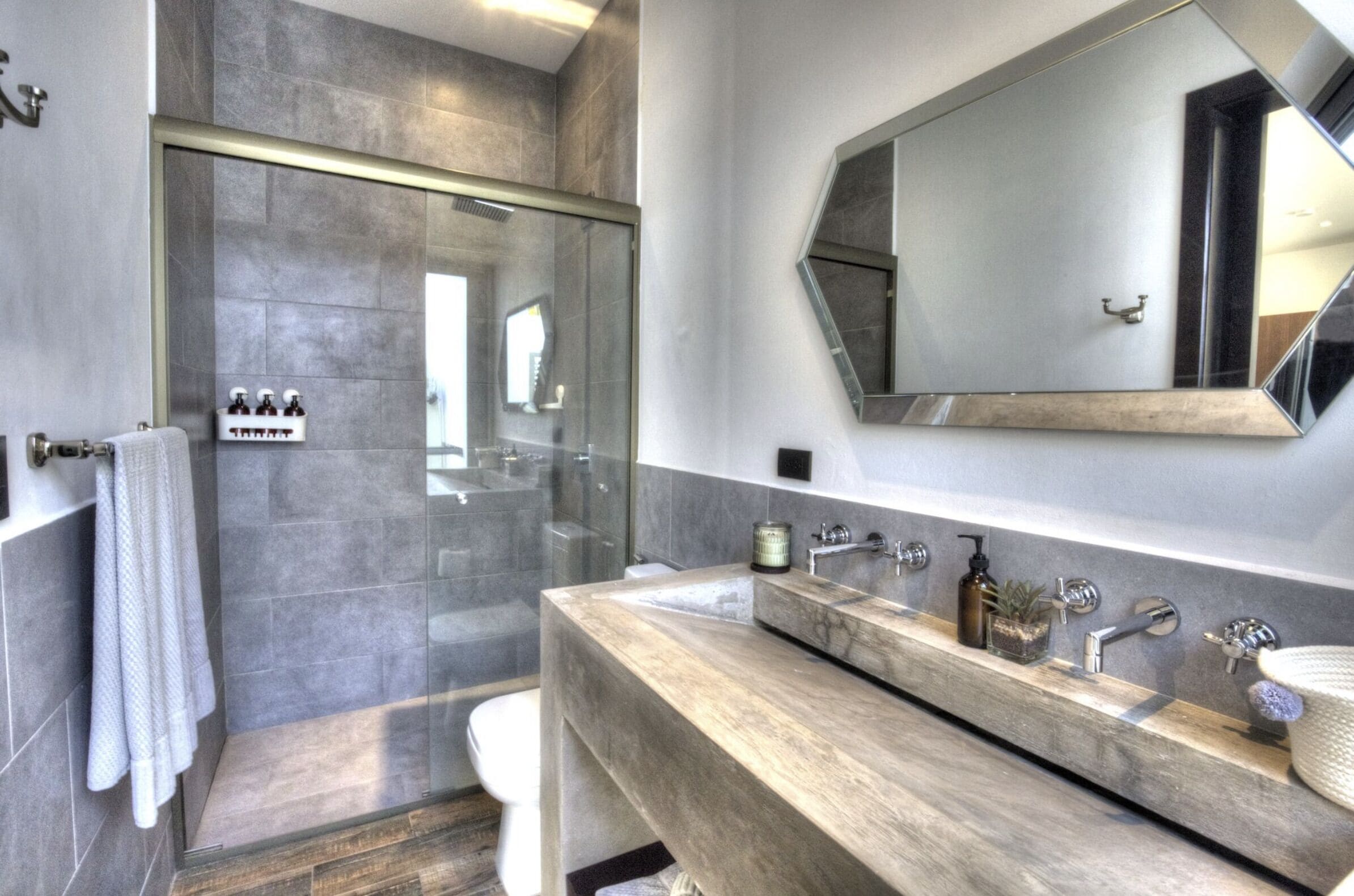 deluxe king suite | bathroom | designer toiletries, hair dryer, bathrobes, bidet