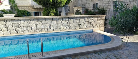 Outdoor pool, sun loungers