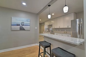 Fridge, microwave, oven, stovetop - Family Home on Bellows Lake, with new pool. 6505 Walton Way (Tampa)