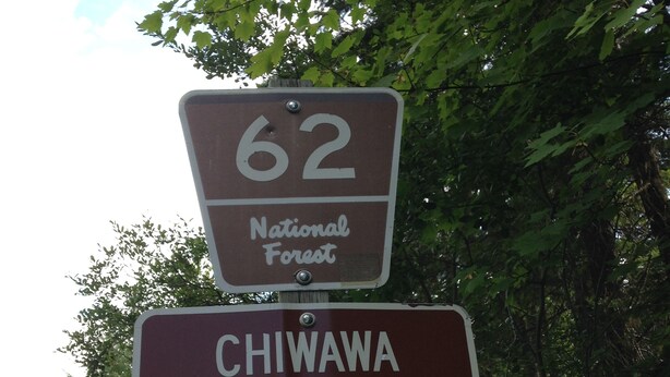 A sign for National Forest 62 and Chiwawa Valley Road. - Homestead Living at Lake Wenatchee (Leavenworth)