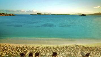 On the beach, sun loungers, beach towels