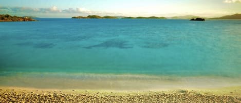 On the beach, sun-loungers, beach towels