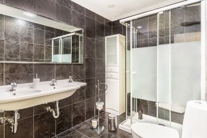 Bathtub, hair dryer, towels