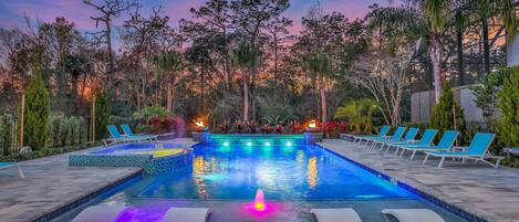 A heated pool, pool loungers