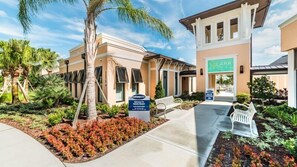 Welcome to Solara Resort, where a beautiful garden and inviting entrance set the tone for a relaxing stay.