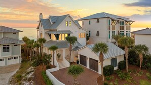 A multi-story coastal property with a large deck and a view of the ocean. - Stunning Retreat w/Gulf views, heated pool, beach access, and bikes. Sleeps 12! (Seagrove Beach)