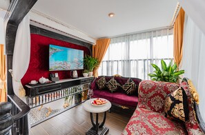 Athena Suite | Living area | Flat-screen TV - Athena Hotel (Quy Nhon)