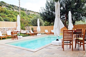 Outdoor pool, pool umbrellas, pool loungers