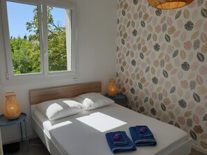 2 quartos, ferros/tábuas de passar roupa, Wi-Fi de cortesia