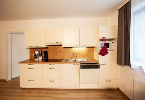 Fridge, microwave, dishwasher, coffee/tea maker