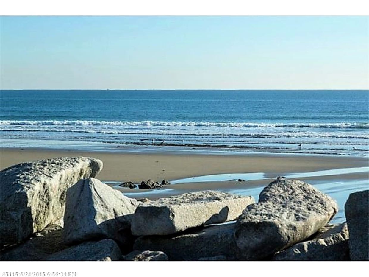 On the beach, sun-loungers, beach towels