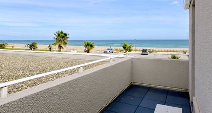 A seafront dream with garden and private parking.