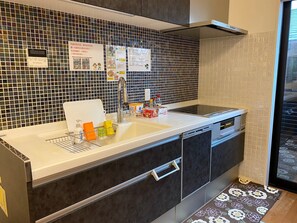 Fridge, microwave, stovetop, cookware/dishes/utensils
