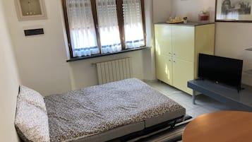 1 bedroom, iron/ironing board, travel crib, bed sheets