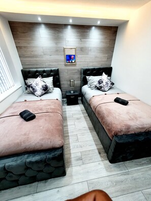 5 bedrooms, memory foam beds, blackout drapes, free WiFi