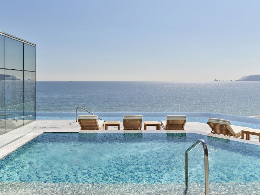 Indoor pool, outdoor pool, open 6:00 AM to 10:00 PM, sun loungers