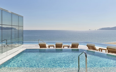 Indoor pool, outdoor pool, open 6:00 AM to 10:00 PM, sun loungers