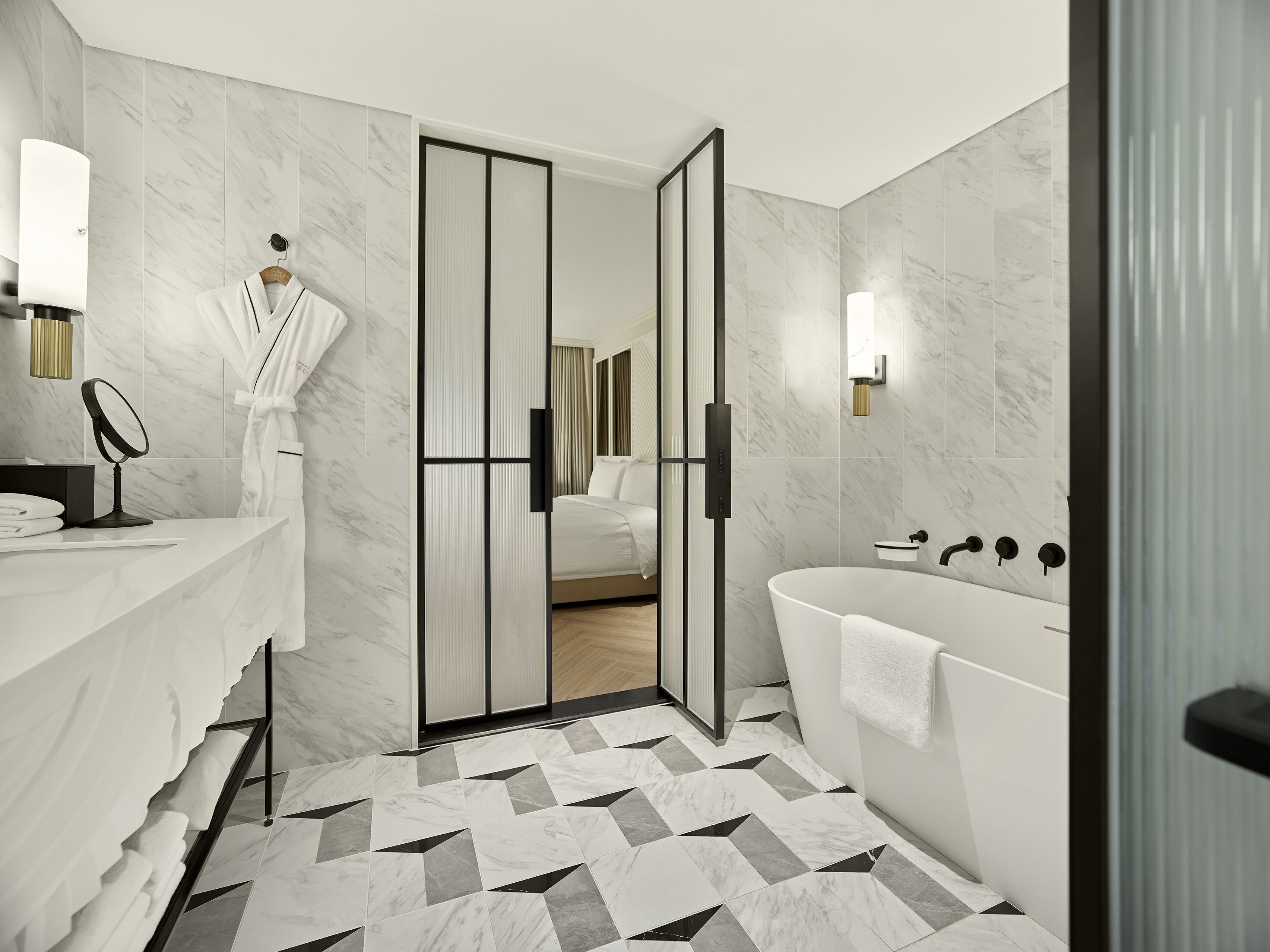 executive suite | bathroom | hair dryer, bathrobes, slippers, towels