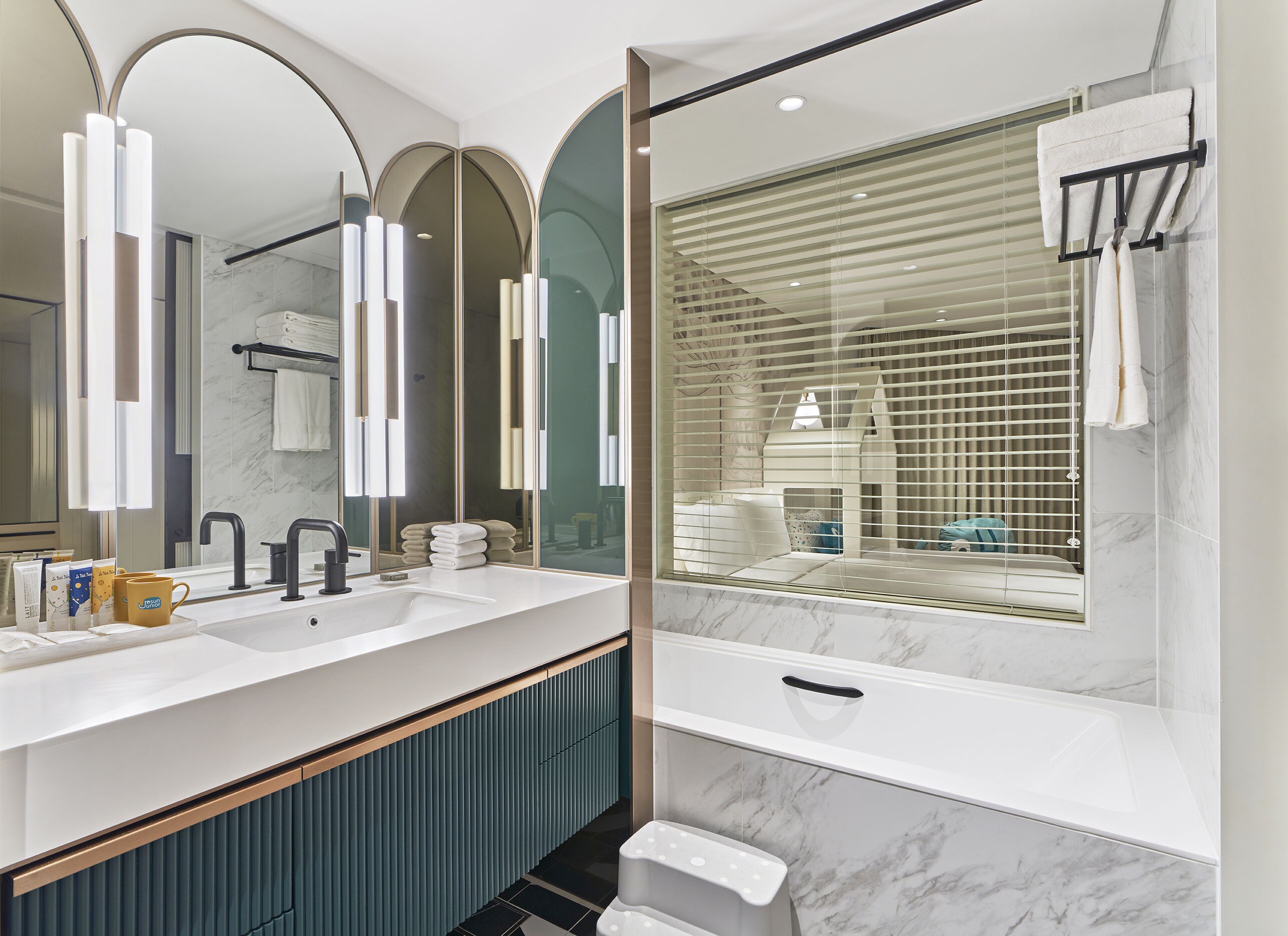 hair dryer, bathrobes, slippers, towels