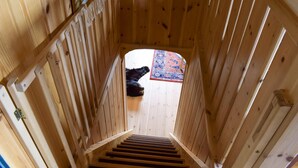 A wooden interior with a staircase leading to a room. - 2 bedroom awesome home in Nordberg (Nordberg)