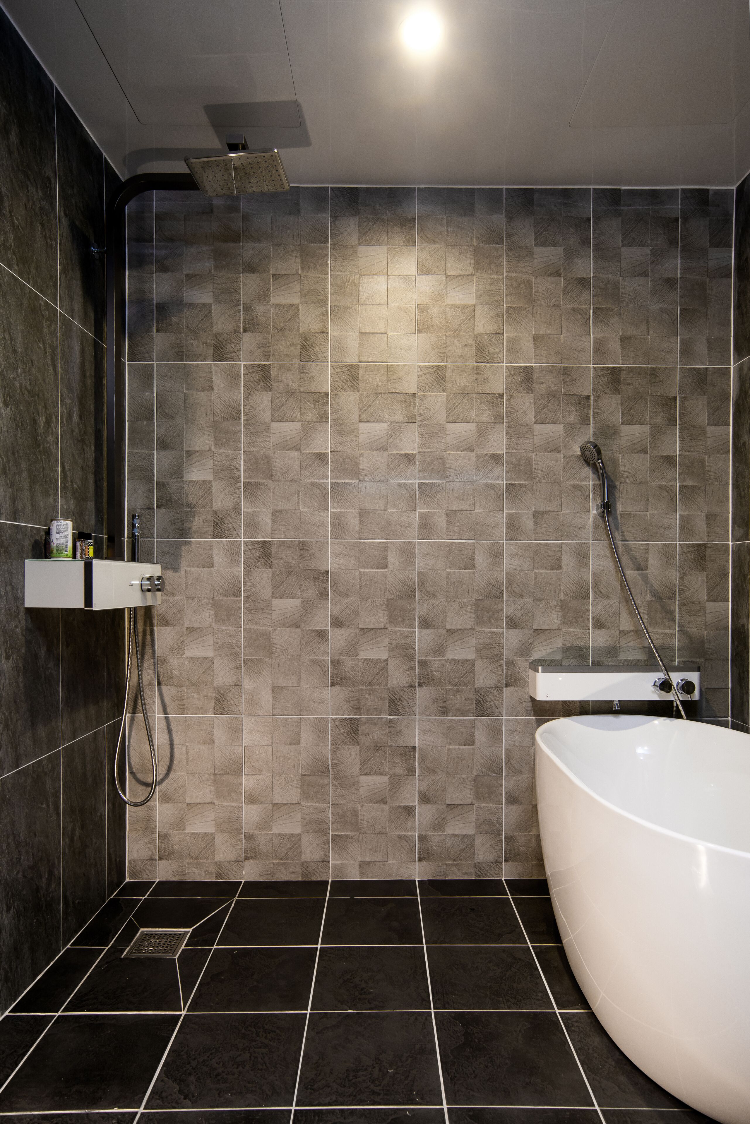 deluxe room | bathroom | shower, free toiletries, hair dryer, bathrobes