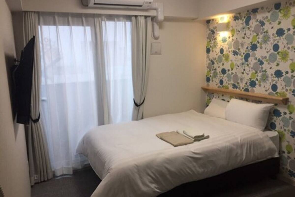 large room | blackout curtains, free wifi, bed sheets