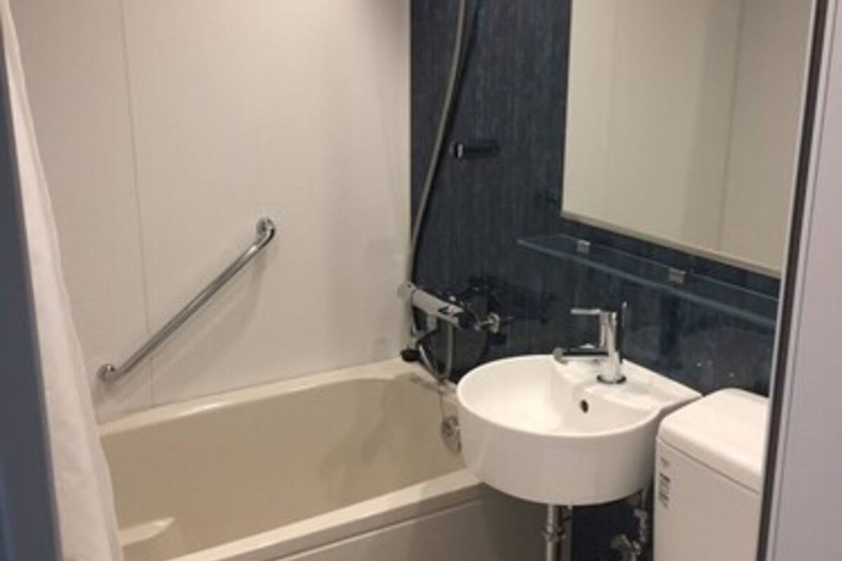 large room | bathroom | hair dryer, dressing gowns, slippers, electronic bidet