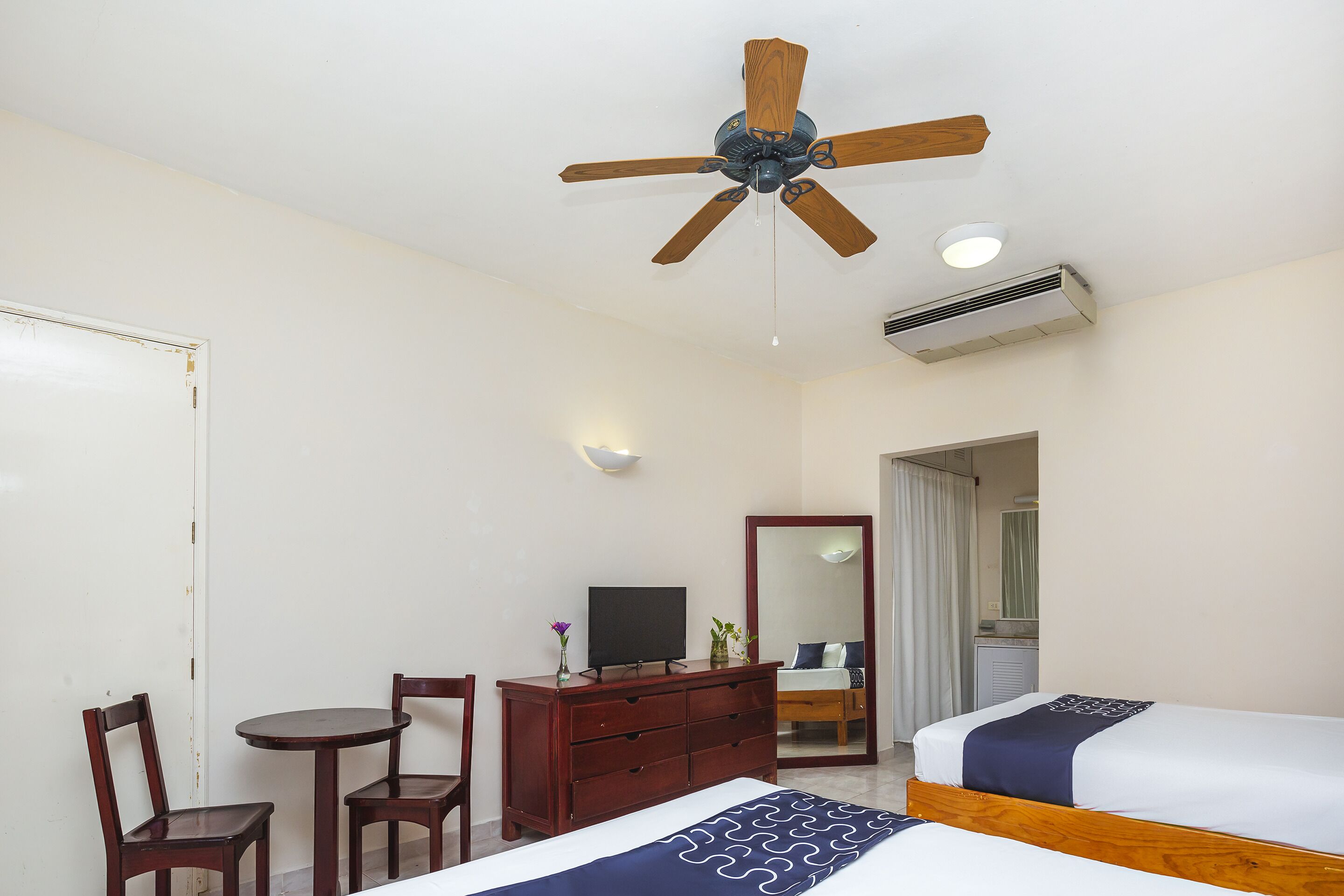 standard double room, 2 double beds | down duvets, minibar, desk, laptop workspace