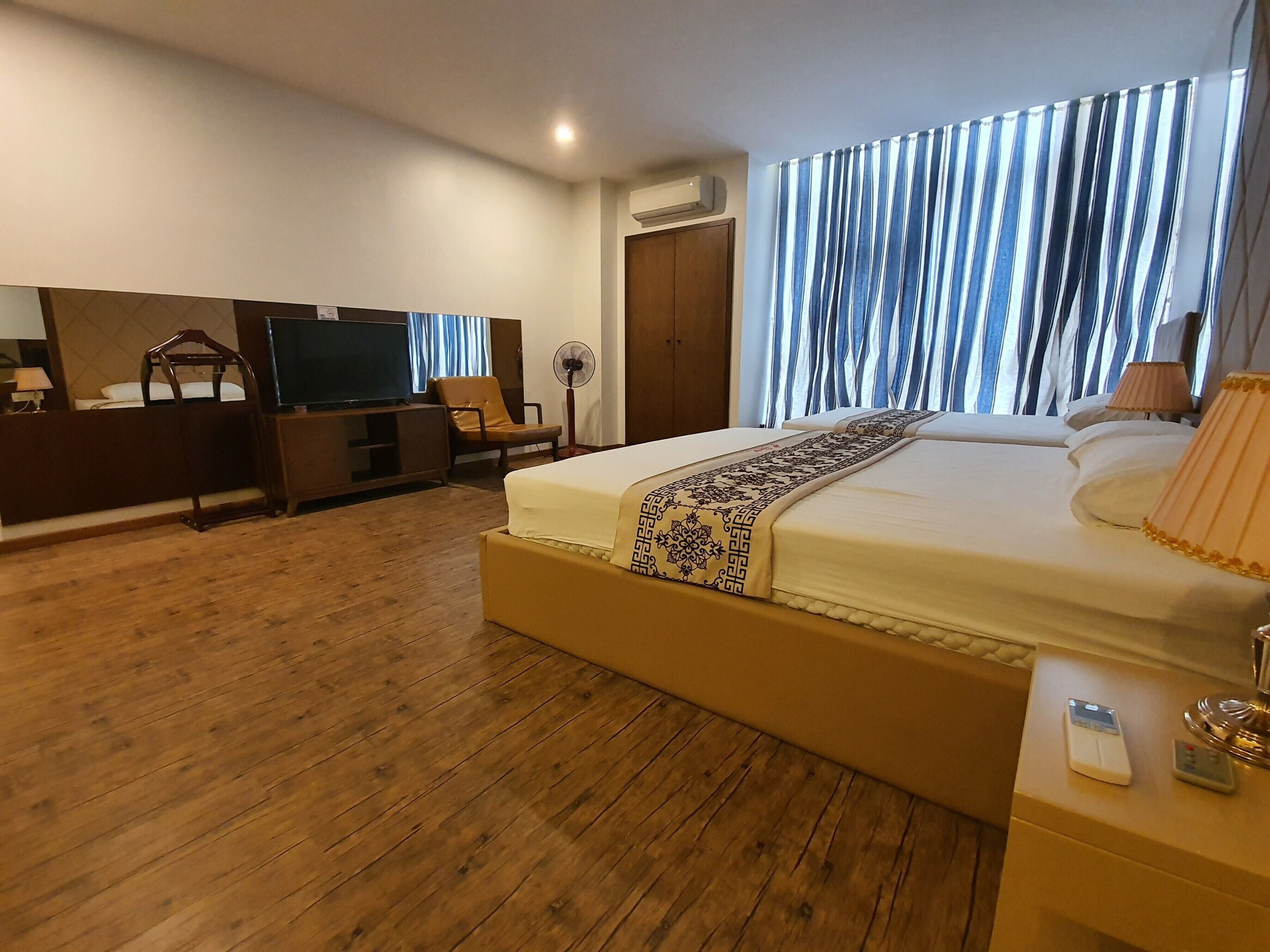 family double or twin room | minibar, desk, blackout curtains, soundproofing