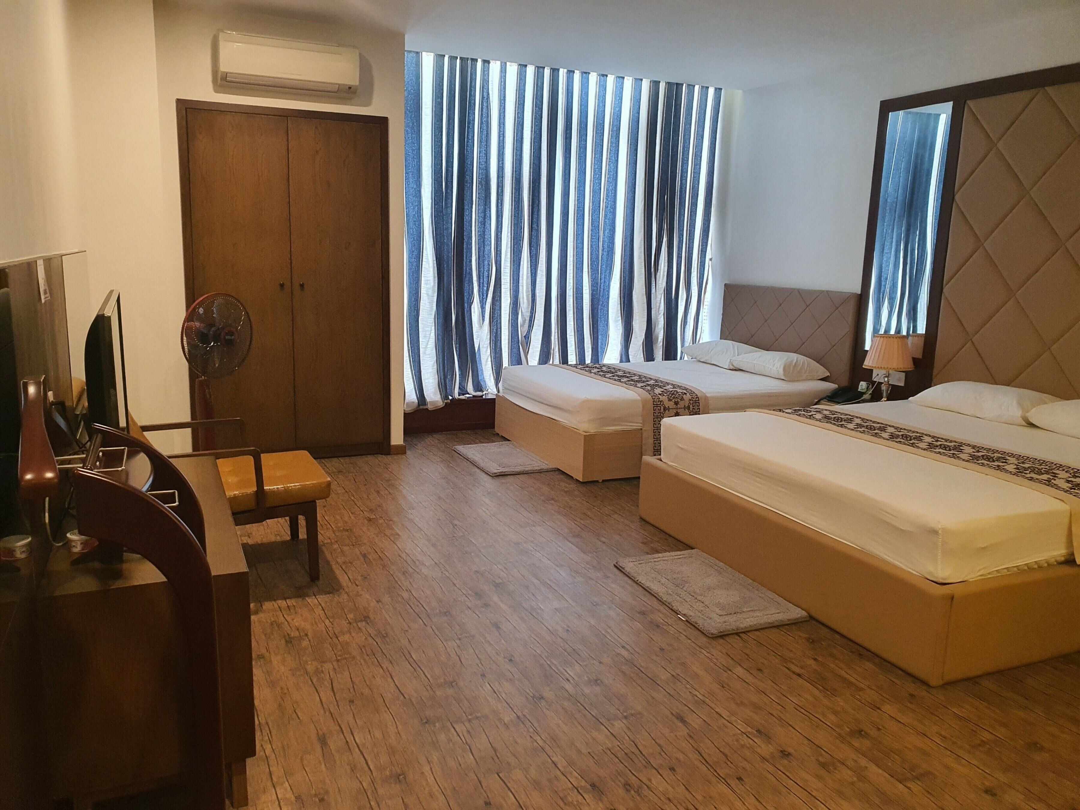 family double or twin room | minibar, desk, blackout curtains, soundproofing